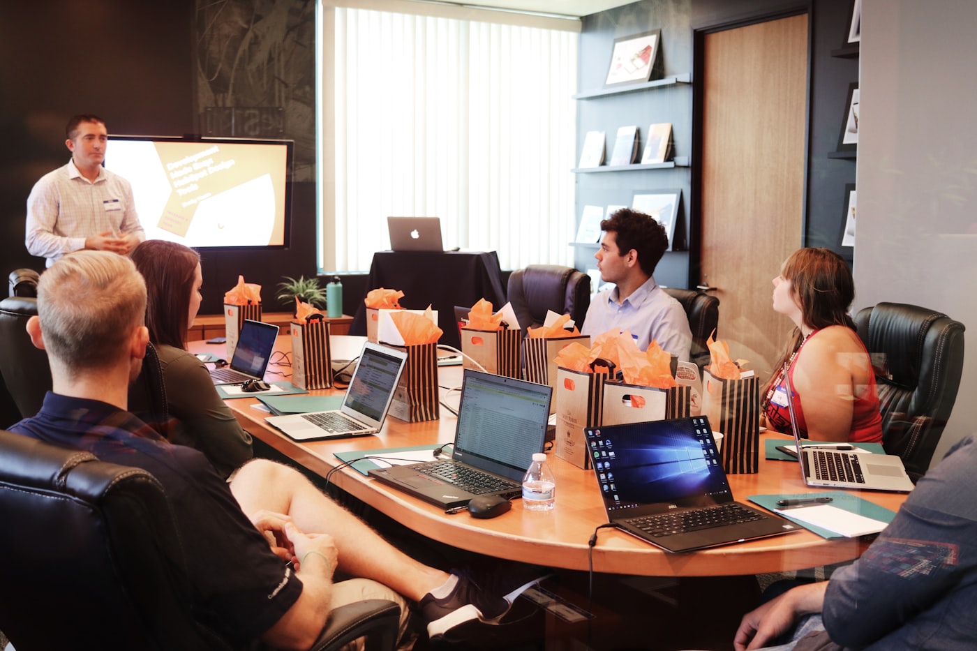 Voila Digital creative team reviewing designs in a studio workshop